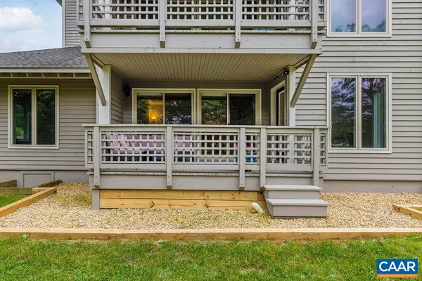 a view of house with yard