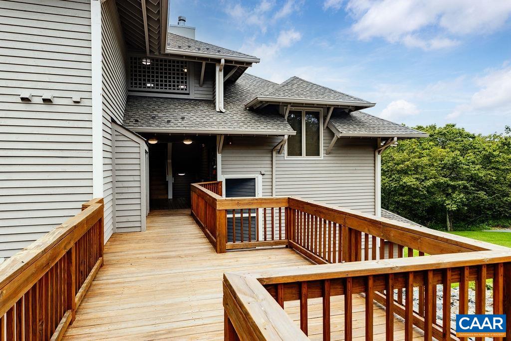 3234 North Ridge Roseland, VA 22967 - Photo 4 of 32 a view of a house with wooden deck and furniture