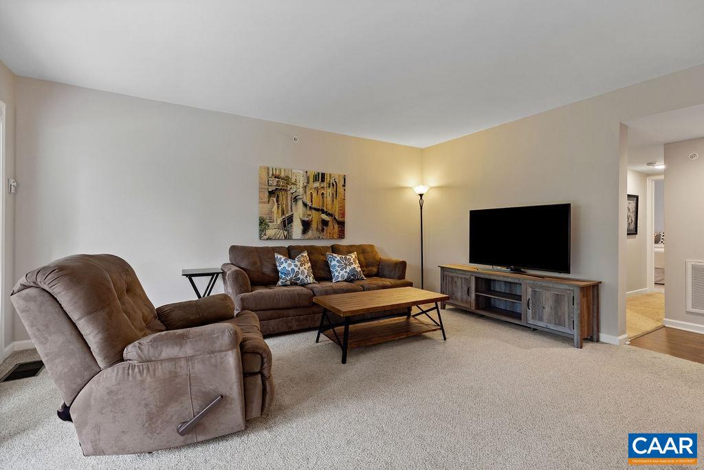 3234 North Ridge Roseland, VA 22967 - Photo 6 of 32 a living room with furniture and a flat screen tv