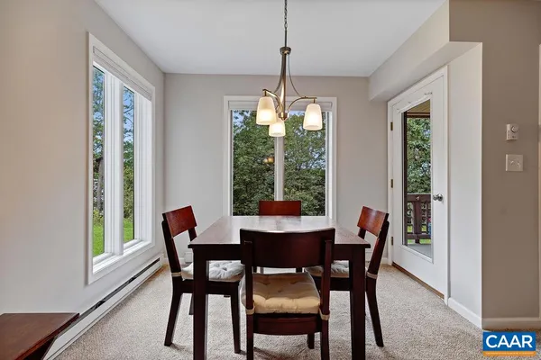 a kitchen with stainless steel appliances granite countertop a sink and a stove top oven