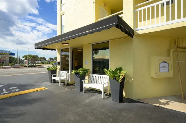 a view of a hallway with stairs