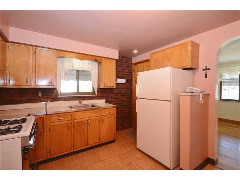 5180 Curry Road Baldwin, PA 15236 - Photo 12 of 21 Kitchen. Original Kitchen but clean and move in ready. Cabinets are solid wood, you could paint or just do new hardware~