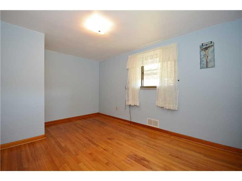 5180 Curry Road Baldwin, PA 15236 - Photo 18 of 21 Bedroom. 2nd bedroom w/beautiful hardwood floors. Nice little extra nook for a dresser or desk~