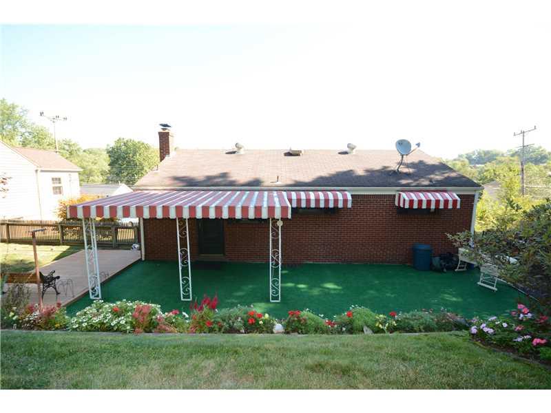 5180 Curry Road Baldwin, PA 15236 - Photo 5 of 21 Exterior Back. Beautiful Flowers!! Covered back porch with outdoor carpeting. Updated roof, awnings~