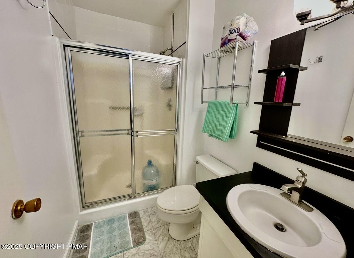 3580 High Crest Road Canadensis, PA 18325 - Photo 15 of 17 a bathroom with a sink toilet and shower