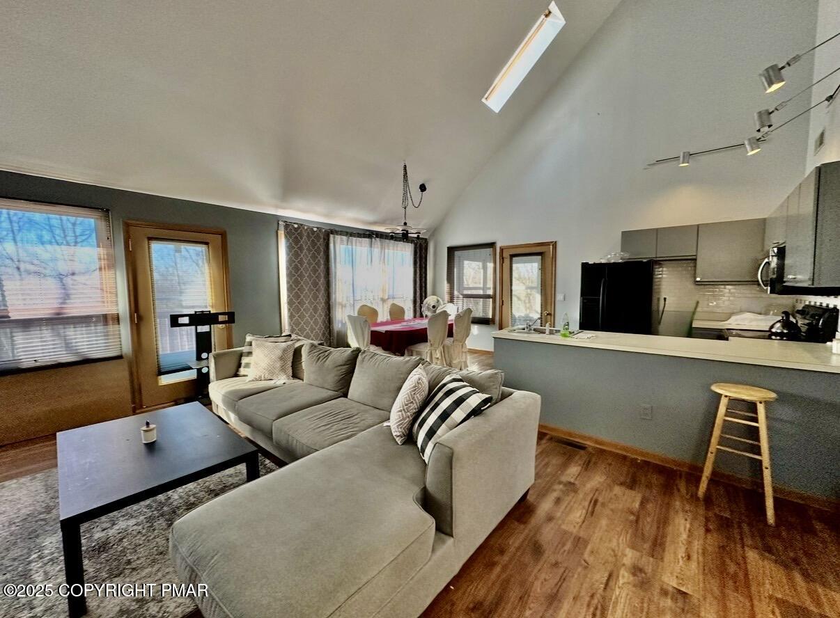 3580 High Crest Road Canadensis, PA 18325 - Photo 6 of 17 a living room with furniture wooden floor and a flat screen tv
