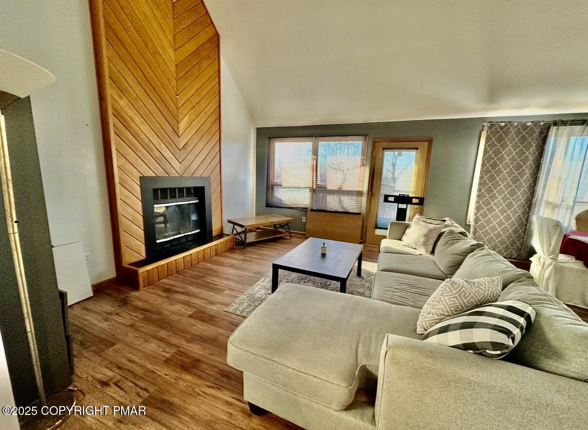 3580 High Crest Road Canadensis, PA 18325 - Photo 7 of 17 a living room with furniture and a fireplace