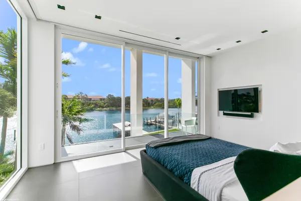 a room with a bed and a window