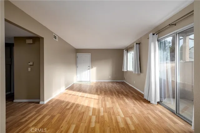 a view of an empty room and window