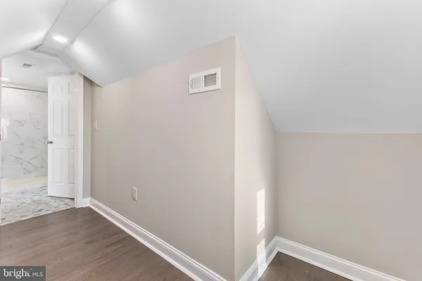 a view of hallway with closet