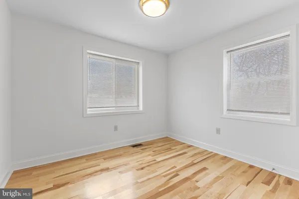 a view of a room that has a window in it