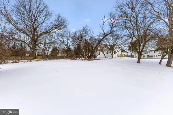 a street view covered with snow
