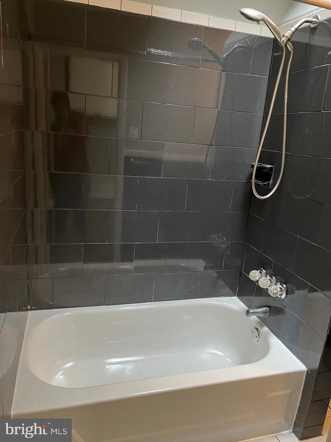 4329 Dungan Street Philadelphia, PA 19124 - Photo 8 of 13 a bathroom with a bathtub