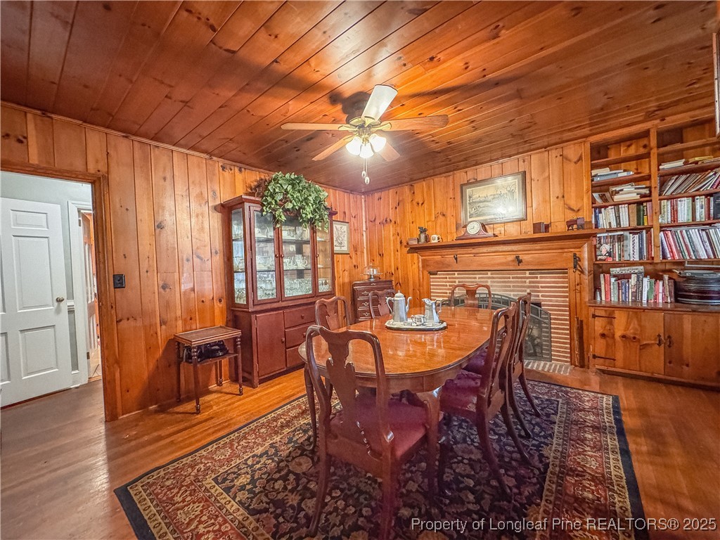 1108 North Fulton Street Raeford, NC 28376 - Photo 5 of 13 Formal Dining room with built ins and fireplace
