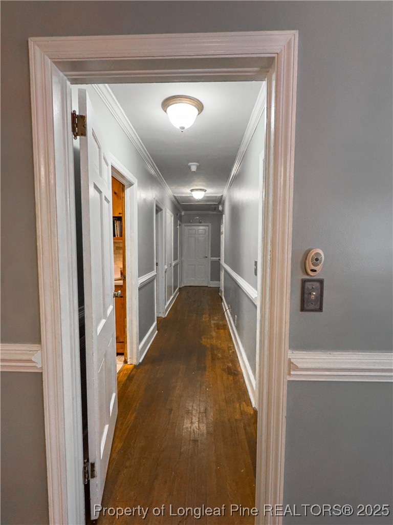 1108 North Fulton Street Raeford, NC 28376 - Photo 6 of 13 Hallway to bedrooms and full bathroom