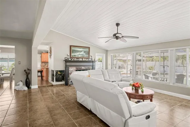 an aerial view of a house with a swimming pool