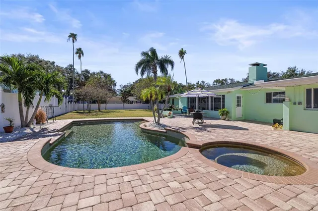 a kitchen with a stove microwave and cabinets