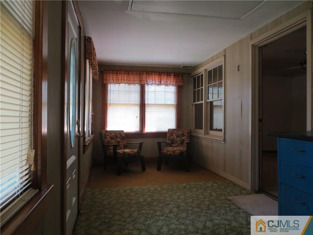 147 Milltown Road East Brunswick, NJ 08816 - Photo 14 of 23 a room with furniture and a window