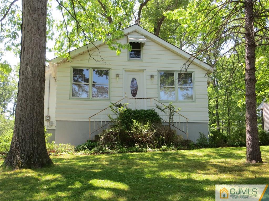 147 Milltown Road East Brunswick, NJ 08816 - Photo 22 of 23 a view of a house with a yard