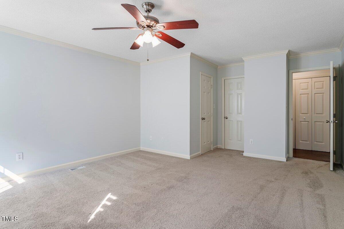 8337 Greywinds Drive Raleigh, NC 27615 - Photo 19 of 27 a view of an empty room