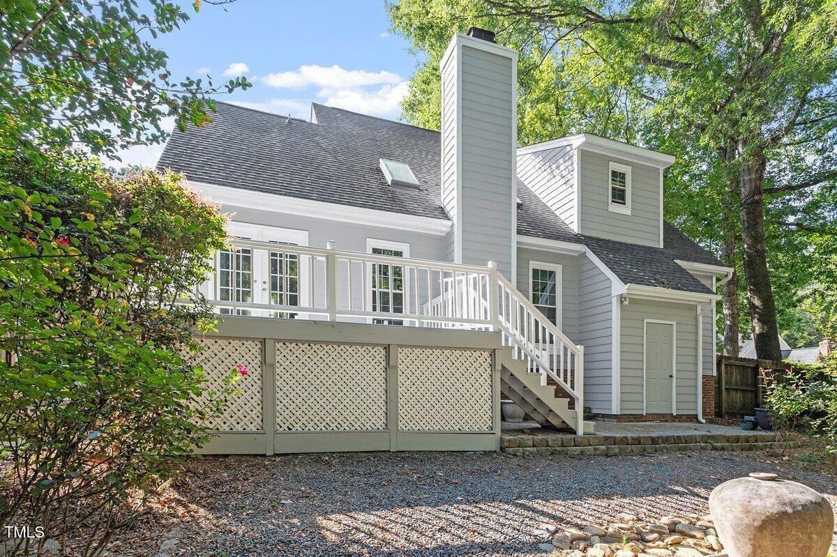 8337 Greywinds Drive Raleigh, NC 27615 - Photo 24 of 27 a front view of a house with a yard
