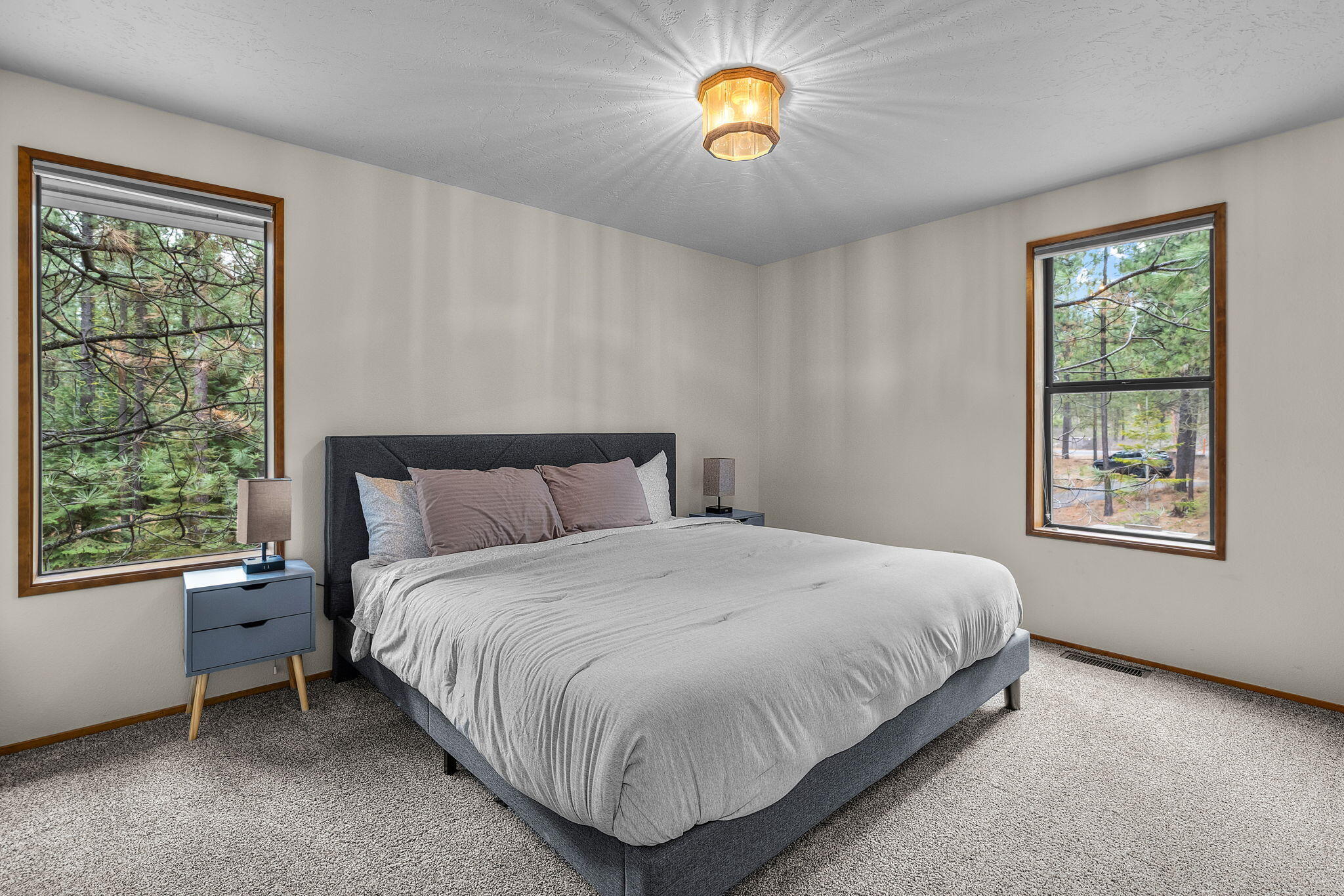 13168 Hawks Beard Black Butte Ranch, OR 97759 - Photo 31 of 47 a bedroom with a bed and a window