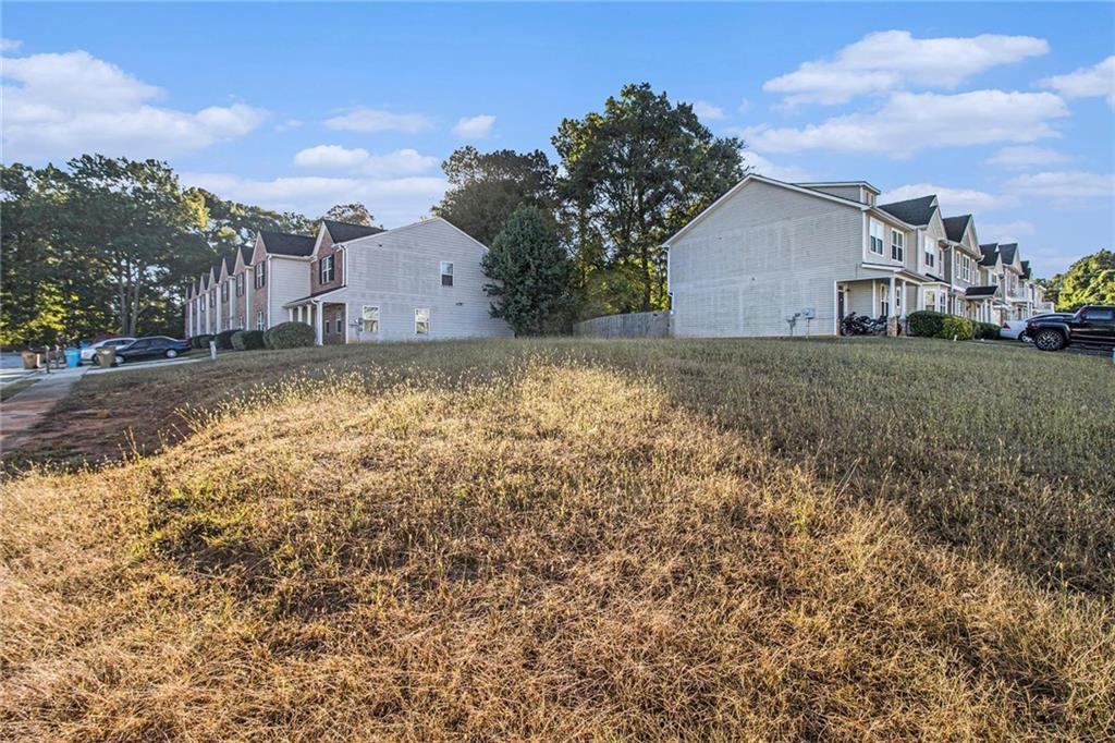 3571 Rock Ridge Drive Rex, GA 30273 - Photo 5 of 5 a view of a house with a yard
