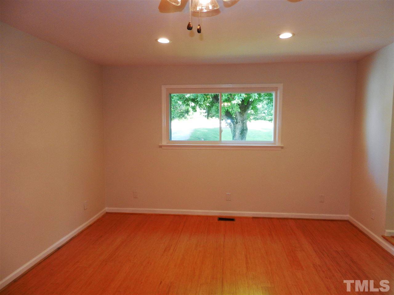 11916 Us 64 A Spring Spring Hope, NC 27882 - Photo 13 of 25 an empty room with a window