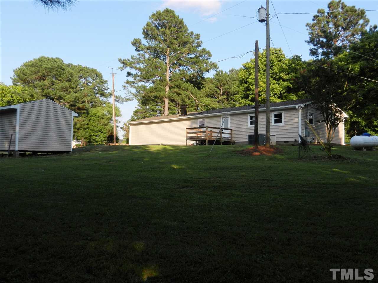 11916 Us 64 A Spring Spring Hope, NC 27882 - Photo 22 of 25 a house view with a garden space