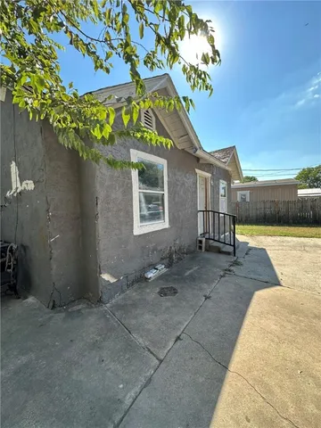 a view of a house with a patio