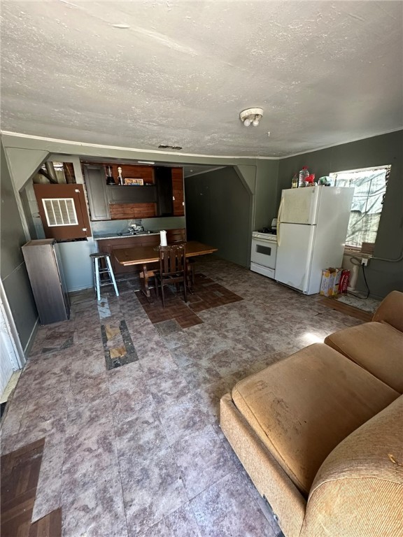 1807 McArthur Avenue Bryan, TX 77803 - Photo 12 of 30 a living room with furniture and a rug