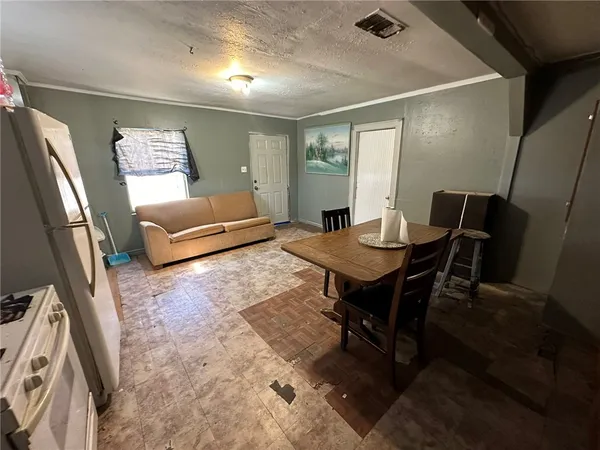 a workspace with furniture and a rug