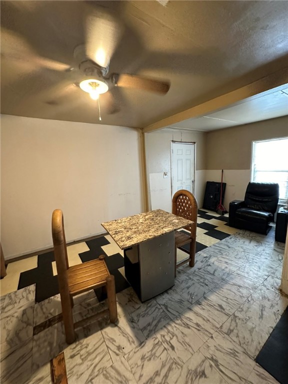 1807 McArthur Avenue Bryan, TX 77803 - Photo 22 of 30 a living room with furniture a lamp and a rug