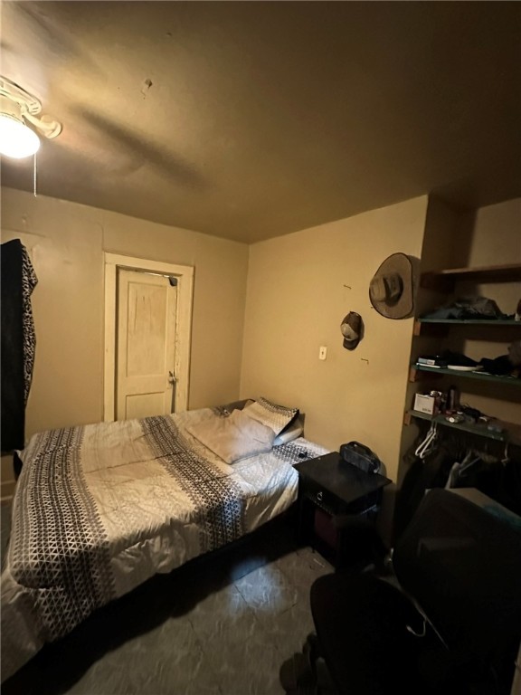 1807 McArthur Avenue Bryan, TX 77803 - Photo 26 of 30 a bedroom with a bed and a dresser