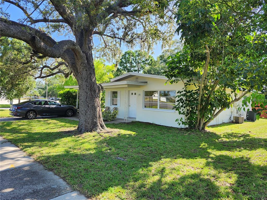 607 McMullen Booth Road Clearwater, FL 33759 - Photo 1 of 1 a view of a house with a yard