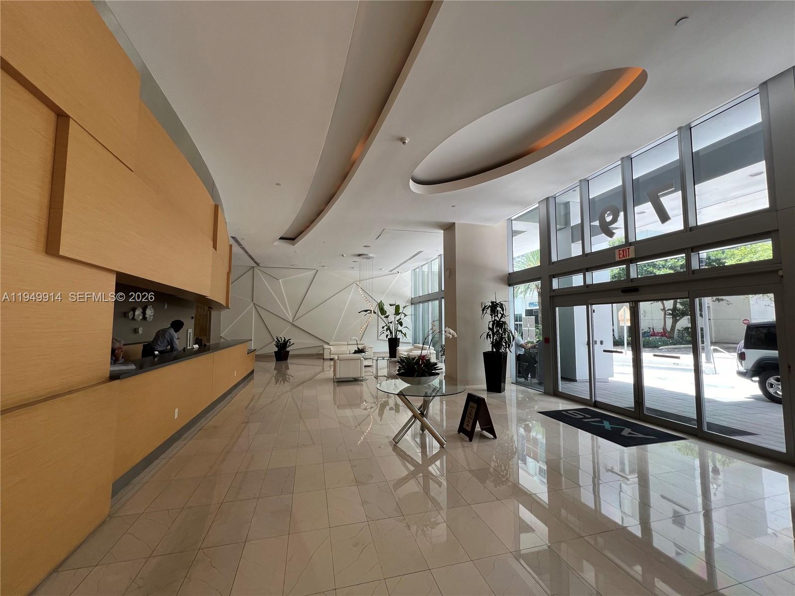 79 Southwest 12th Street, Unit 1704S Miami, FL 33130 - Photo 3 of 20 a gym with natural light