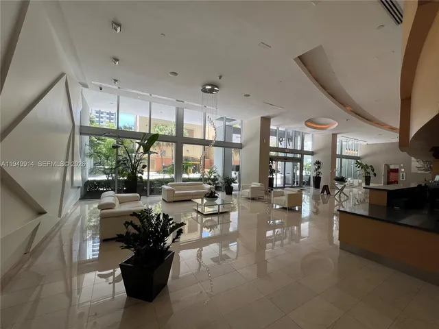 a room with musical instrument pool table and windows