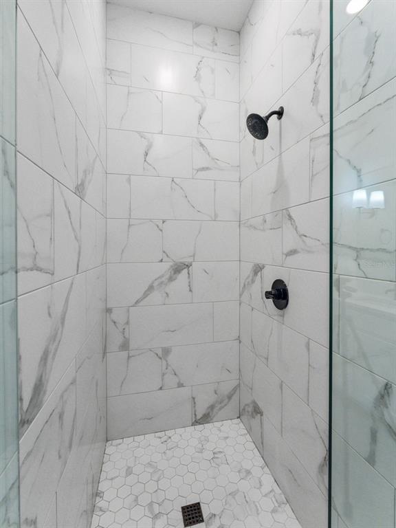 3421 West Horatio Street, Unit 109 Tampa, FL 33609 - Photo 11 of 20 a bathroom with a shower