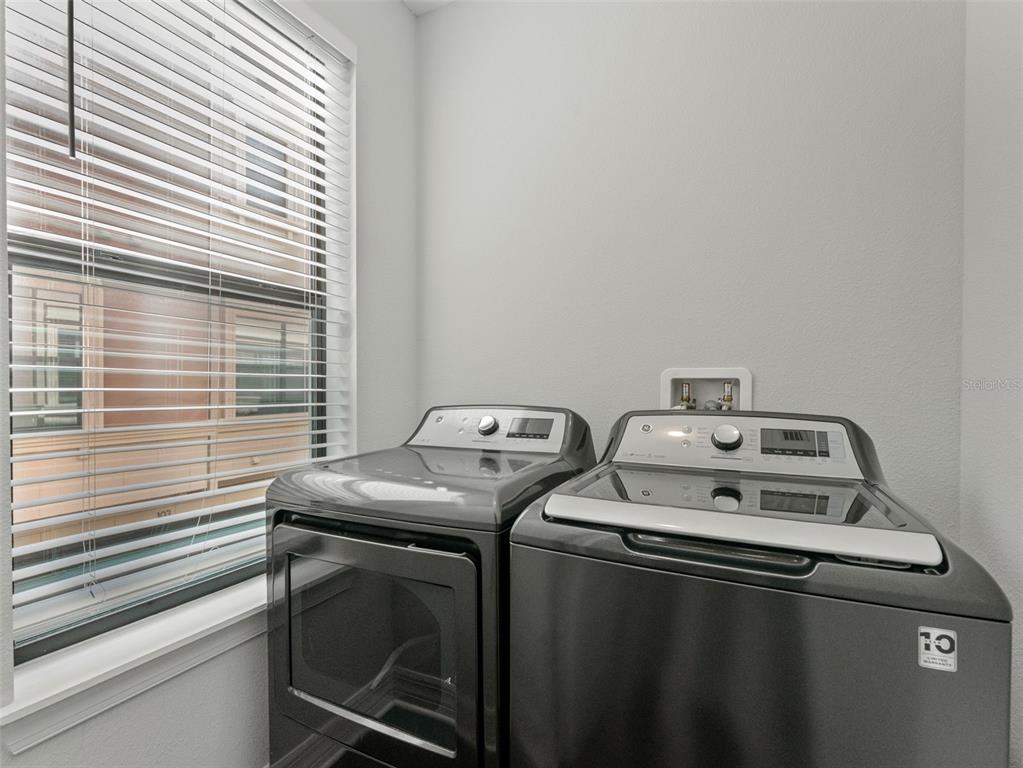 3421 West Horatio Street, Unit 109 Tampa, FL 33609 - Photo 16 of 20 a utility room with dryer and washer