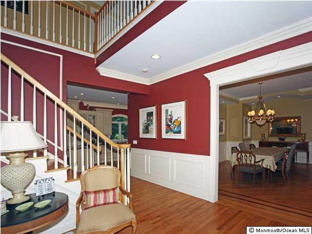 20 Saddle Ridge Road Colts Neck, NJ 07722 - Photo 3 of 3 a dining room with furniture a rug and wooden floor