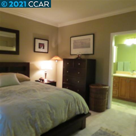 2683 Oak Road Walnut Creek, CA 94597 - Photo 13 of 19 a bedroom with a bed and a dresser