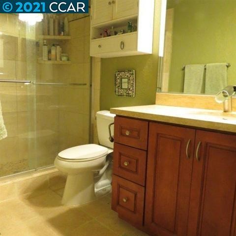 2683 Oak Road Walnut Creek, CA 94597 - Photo 14 of 19 a bathroom with a sink and a toilet