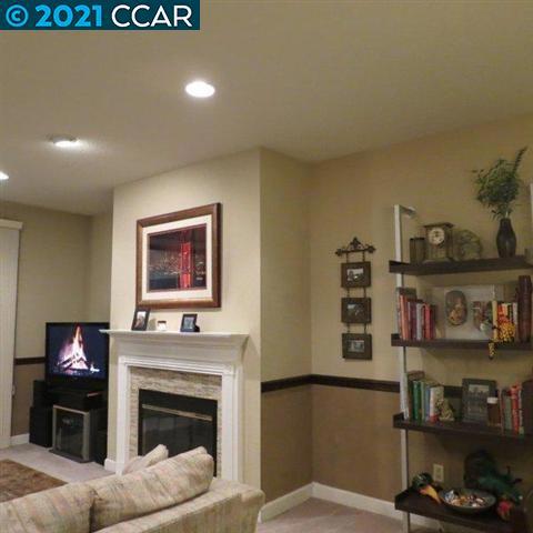 2683 Oak Road Walnut Creek, CA 94597 - Photo 5 of 19 a living room with furniture and a fireplace