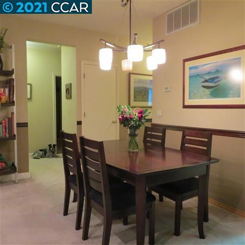 2683 Oak Road Walnut Creek, CA 94597 - Photo 6 of 19 a view of a dining room with furniture