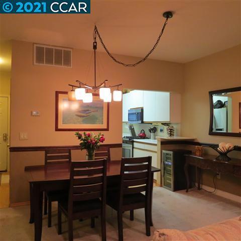 2683 Oak Road Walnut Creek, CA 94597 - Photo 7 of 19 a kitchen with a sink cabinets and wooden floor