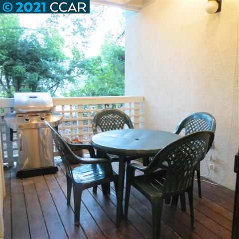 2683 Oak Road Walnut Creek, CA 94597 - Photo 9 of 19 a view of a chairs and table on the deck