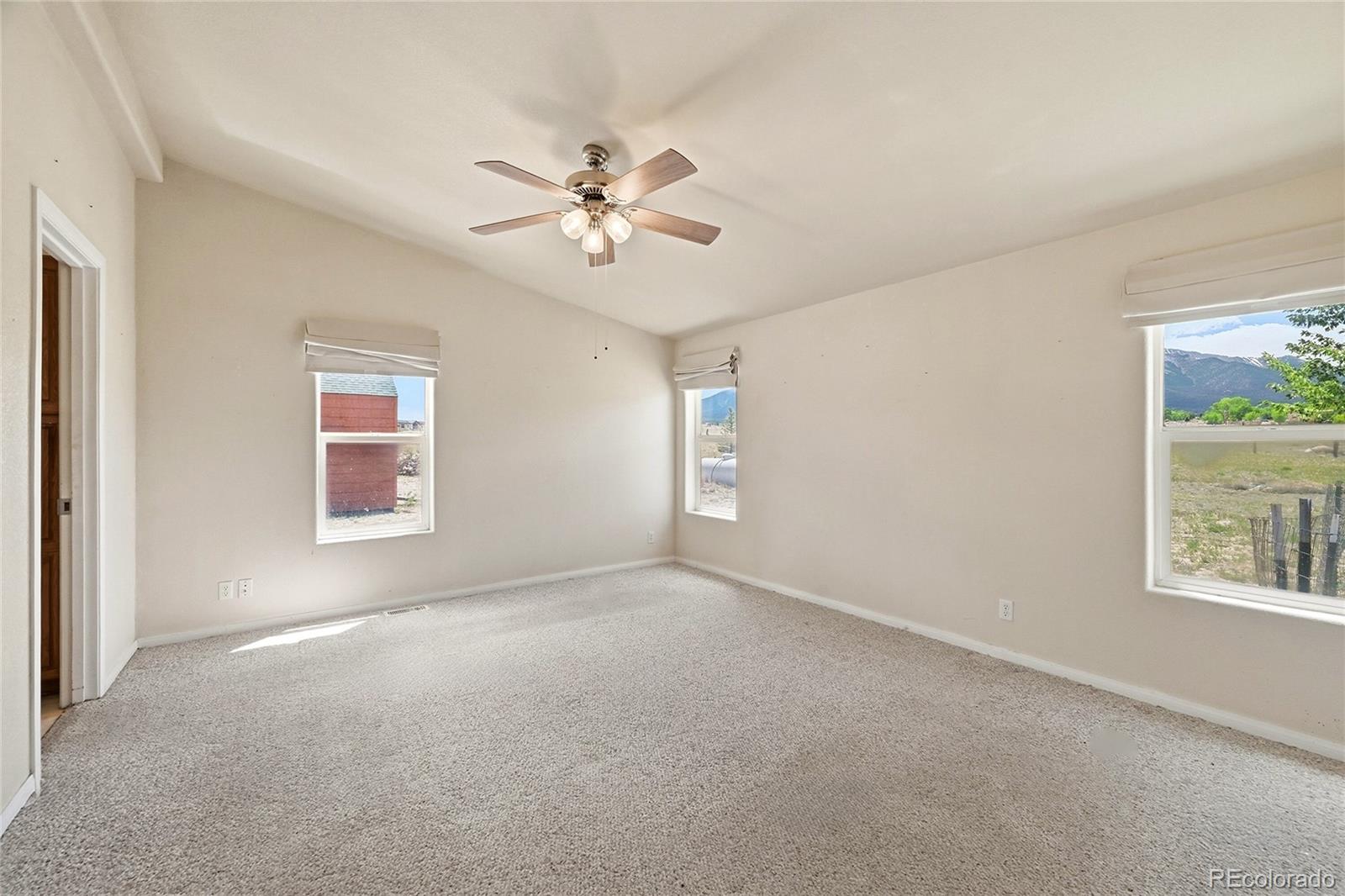 20300 Old Ranch Loop Nathrop, CO 81236 - Photo 15 of 35 a view of an empty room with a window