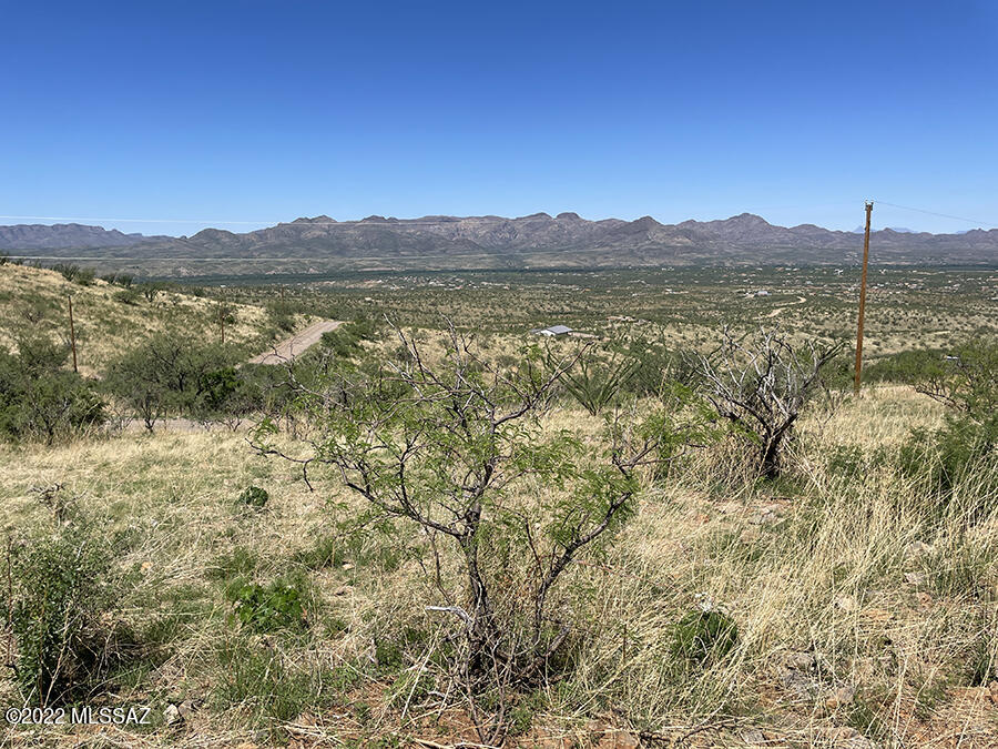332 Dock Street, Unit 2 Rio Rico, AZ 85648 - Photo 1 of 6 a view of a large mountain with mountains in the background