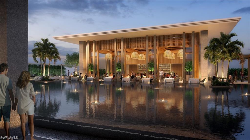 6869 Grenadier Boulevard, Unit 1004 Naples, FL 34108 - Photo 4 of 11 a view of swimming pool with outdoor seating