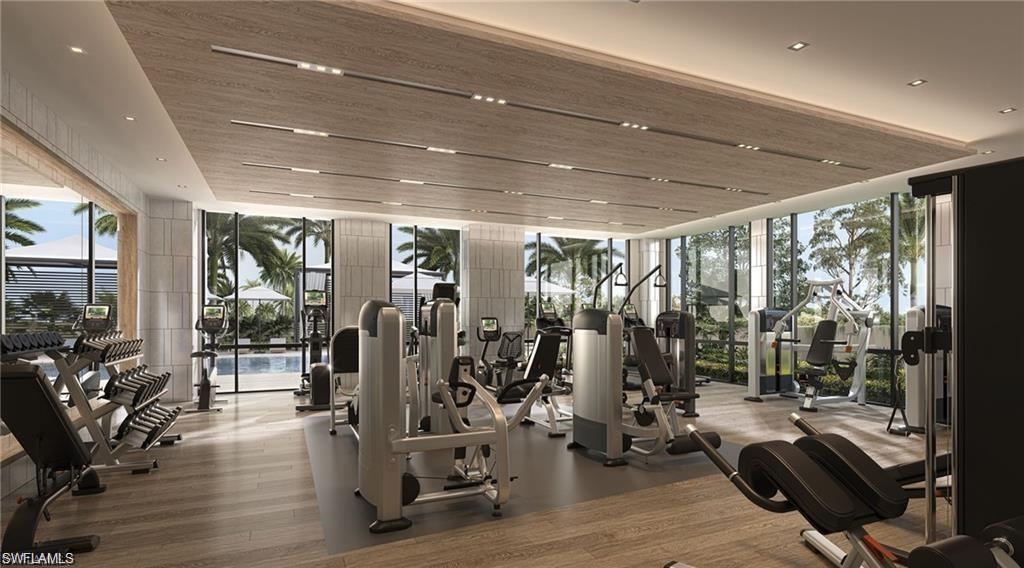 6869 Grenadier Boulevard, Unit 1004 Naples, FL 34108 - Photo 9 of 11 a view of a room with gym equipment